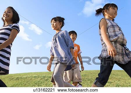 School children walking at riverbank View Large Photo Image Stock Image - School children walking at riverbank. Fotosearch