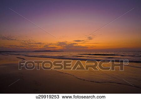 Stock Image - Sea at Sunset. Fotosearch