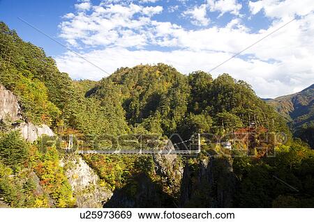 Setoai gorge and Watarashai suspension bridge, Tochigi Prefecture, Honshu, Japan View Large Photo Image Stock Photo - Setoai gorge and Watarashai suspension bridge, Tochigi Prefecture, Honshu, Japan. Fotosearch