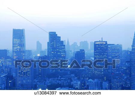 Stock Photo - Skyline of Minato Ward at dusk, Tokyo Prefecture, Honshu, Japan. Fotosearch