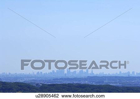 Stock Image - Skyline of Tokyo viewed from Sagamiharam Kanagawa Prefecture, Honshu, Japan. Fotosearch