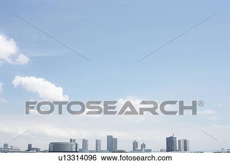 Stock Photograph - Skyline of Toyosu area, Tokyo Prefecture, Honshu, Japan. Fotosearch