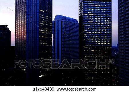 Skyscraper of Shinjuku Ward at dusk, Tokyo Prefecture, Honshu, Japan View Large Photo Image Stock Photo - Skyscraper of Shinjuku Ward at dusk, Tokyo Prefecture, Honshu, Japan. Fotosearch