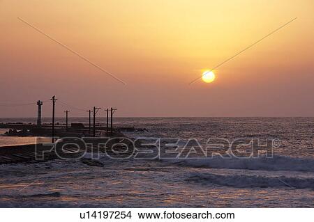Sunset Over the Ocean, Silhouette of Pier View Large Photo Image Picture - Sunset Over the Ocean, Silhouette of Pier. Fotosearch