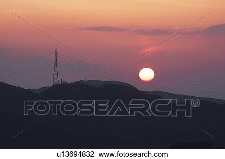 Sunset Sky Over the Silhouette of Mountains View Large Photo Image Stock Image - Sunset Sky Over the Silhouette of Mountains. Fotosearch