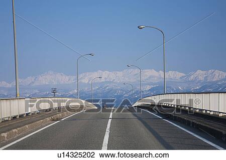 Tateyama mountain range and road, Toyama Prefecture, Honshu, Japan View Large Photo Image Stock Image - Tateyama mountain range and road, Toyama Prefecture, Honshu, Japan. Fotosearch