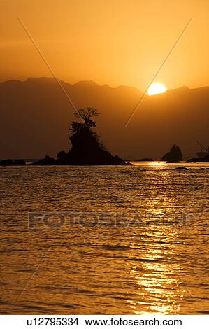 Picture - Toyama bay and Tateyama mountain range at dawn, Toyama Prefecture, Honshu, Japan. Fotosearch