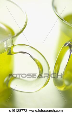 Stock Image - Two glasses of green tea. Fotosearch