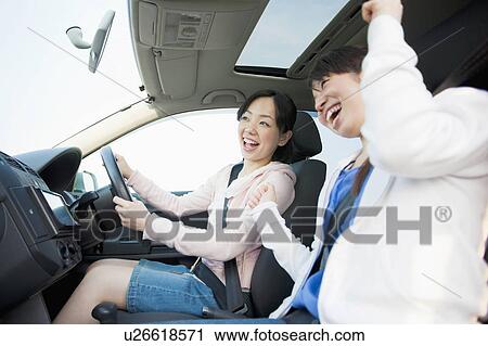 Two Young Women in Car View Large Photo Image Stock Image - Two Young Women in Car. Fotosearch