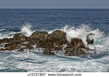 Stock Photo - Water Splashing on Rocks. Fotosearch