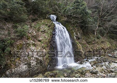 Stock Photo - Waterfall in the Valley. Fotosearch
