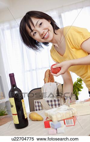 Woman Sorting Out Grocery Shopping View Large Photo Image Stock Photography - Woman Sorting Out Grocery Shopping. Fotosearch