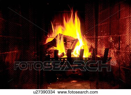 Wood burning in fire place View Large Photo Image Picture - Wood burning in fire place. Fotosearch