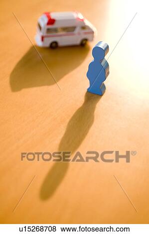 Wooden figure and ambulance View Large Photo Image Stock Photo - Wooden figure and ambulance. Fotosearch