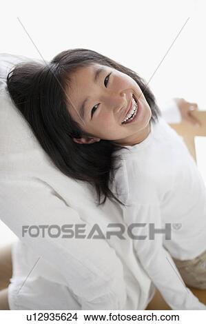 Young Girl Back to Back With her Mother View Large Photo Image Picture - Young Girl Back to Back With her Mother. Fotosearch