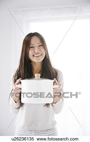 Young Woman Holding Deep Pan View Large Photo Image Stock Photography - Young Woman Holding Deep Pan. Fotosearch