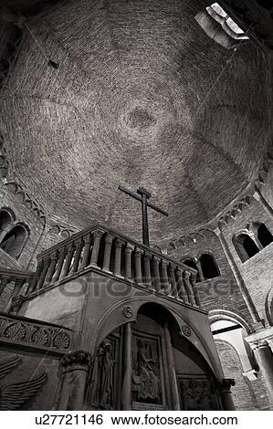 Stock Photograph - Church of Santo Stefano, complex of seven churches, showing Calvary Niche pulpit and cupola of Holy Sepulchre church, Bologna, Italy. Fotosearch