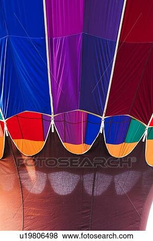 Detail of blue, purple and orange balloon, showing interior and exterior View Large Photo Image Stock Photo - Detail of blue, purple and orange balloon, showing interior and exterior. Fotosearch
