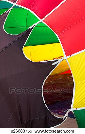Detail of red, green, yellow, black balloon before take off View Large Photo Image Stock Photography - Detail of red, green, yellow, black balloon before take off. Fotosearch