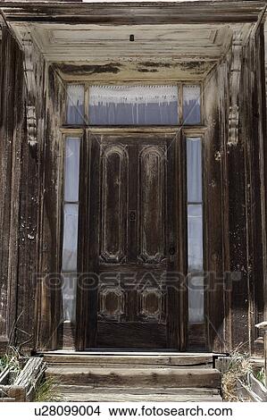 Detail of wooden house with wooden frame door, desaturated image, Bodie pioneer village, California View Large Photo Image Picture - Detail of wooden house with wooden frame door, desaturated image, Bodie pioneer village, California. Fotosearch