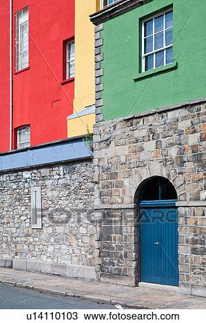 Detail view of south facade of Dublin Castle, with different areas painted green, blue, red, and yellow against grey Norman stone of original fortifications, Dublin, Southern Ireland View Large Photo Image Stock Image - Detail view of south facade of Dublin Castle, with different areas painted green, blue, red, and yellow against grey Norman stone of original fortifications, Dublin, Southern Ireland. Fotosearch
