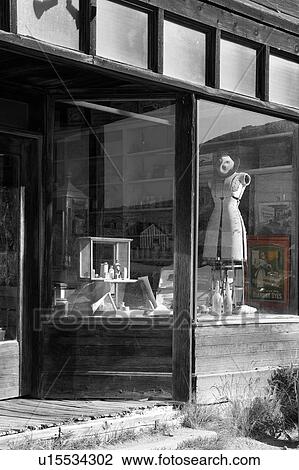 General Store window and entrance, as seen from outside, with rows of shelves full of items for "purchase", desaturated image, Bodie pioneer village, California View Large Photo Image Stock Image - General Store window and entrance, as seen from outside, with rows of shelves full of items for "purchase", desaturated image, Bodie pioneer village, California. Fotosearch