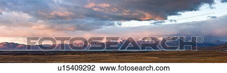 Panorama view of sunrise over the Andes mountain range, El Chalten, Argentina, Patagonia, with stunning pink and blue skyscape. View Large Photo Image Stock Image - Panorama view of sunrise over the Andes mountain range, El Chalten, Argentina, Patagonia, with stunning pink and blue skyscape.. Fotosearch