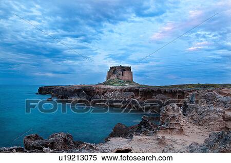 Rocky inlet near Brindisi, with medieval tower ruin, calm sea, and stormy skyscape at sunset, Puglia, Southern Italy View Large Photo Image Stock Photography - Rocky inlet near Brindisi, with medieval tower ruin, calm sea, and stormy skyscape at sunset, Puglia, Southern Italy. Fotosearch