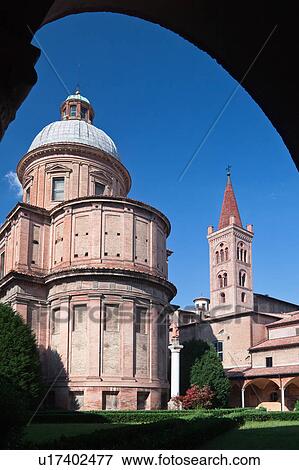 Stock Photo - View from cloisters of dome and apse of church of San Domenico, with campanile beyond, Bologna, Italy. Fotosearch