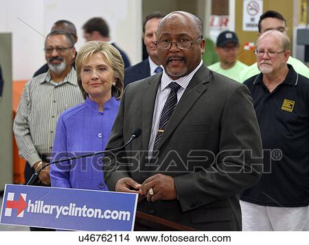 Picture - HENDERSON, NV - OCTOBER 14, 2015: Democratic U. S. presidential candidate & former Secretary of State Hillary Clinton introduced by General President Kenneth Rigmaiden (IUPAT) training center. Fotosearch