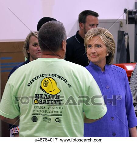 Stock Photo - HENDERSON, NV - OCTOBER 14, 2015: Democratic U. S. presidential candidate & former Secretary of State Hillary Clinton shakes hands at International Union of Painters and Allied Trades (IUPAT) training center. Fotosearch