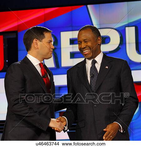 Picture - LAS VEGAS - DECEMBER 15: Republican presidential candidate former Dr. Ben Carson shakes hands with Senator Marco Rubio at CNN republican presidential debate at Venetian, December 15, 2015, Las Vegas, Nevada. Fotosearch