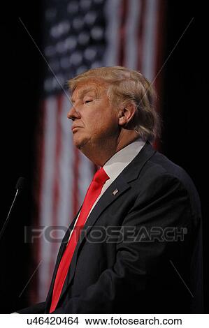 LAS VEGAS NEVADA, DECEMBER 14, 2015: Republican presidential candidate Donald Trump profile and flag at campaign event at Westgate Las Vegas Resort & Casino the day before the CNN Republican Presidential Debate View Large Photo Image Picture - LAS VEGAS NEVADA, DECEMBER 14, 2015: Republican presidential candidate Donald Trump profile and flag at campaign event at Westgate Las Vegas Resort & Casino the day before the CNN Republican Presidential Debate. Fotosearch