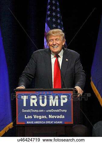 Stock Photo - LAS VEGAS NEVADA, DECEMBER 14, 2015: Republican presidential candidate Donald Trump smiles behind podium at campaign event at Westgate Las Vegas Resort & Casino the day before the CNN Republican Presidential Debate. Fotosearch