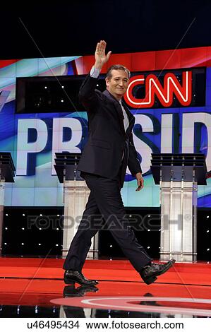 Picture - LAS VEGAS, NV, Dec 15, 2015, Senator Ted Cruz, a Republican from Texas and 2016 presidential candidate, walks and waves on stage at the start of the Republican presidential candidate debate at The Venetian.. Fotosearch