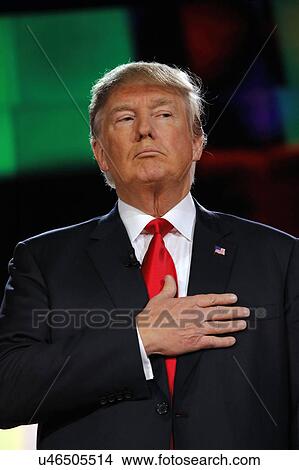 LAS VEGAS, NV - DECEMBER 15: Republican presidential frontrunner Donald J. Trump holds hand over heart at CNN republican presidential debate at The Venetian, December 15, 2015, Las Vegas, Nevada View Large Photo Image Picture - LAS VEGAS, NV - DECEMBER 15: Republican presidential frontrunner Donald J. Trump holds hand over heart at CNN republican presidential debate at The Venetian, December 15, 2015, Las Vegas, Nevada. Fotosearch
