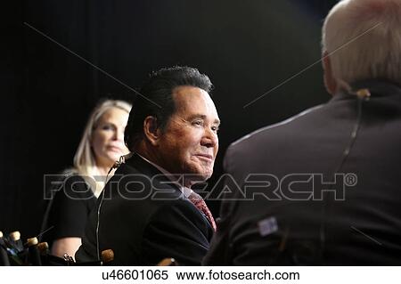 Stock Photography - LAS VEGAS, NV - OCTOBER 13 2015: CNN Democratic presidential debate features music-Vegas entertainment icon and legend, Wayne Newton at Wynn Las Vegas in first CNN Democratic Debate.. Fotosearch