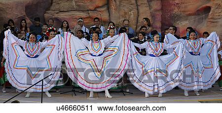 Stock Image - LAS VEGAS, NV - OCTOBER 14, 2015: Mariachi Band and Mexican-American Dancers perform at HillaryClinton for America Nevada Presidential Rally, Springs Preserve Amphitheater, Las Vegas, NV. Fotosearch
