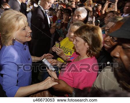 Stock Image - LAS VEGAS, NV - OCTOBER 14, 2015: Hillary Clinton, former U. S. secretary of state and 2016 Democratic presidential candidate, shakes hands at Hillary for America Nevada Rally, Springs Preserve Amphitheater. Fotosearch