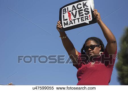 Stock Photography - Los Angeles, California, USA, January 19, 2015, 30th annual Martin Luther King Jr. Kingdom Day Parade, Black Lives Matter sign. Fotosearch