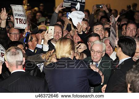 Stock Photograph - news, broadcasting, isolated, footage, guy, broadcast, white, videographer, maker, record, movie, media, sound, cinema, television, videography, video, studio, male, occupation, asian, politics, Las Vegas, digital, shoot, people, worker, technology,.... Fotosearch