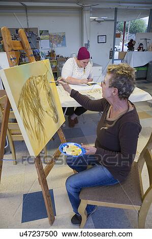 Oak View, California, USA, December 15, art teacher paints horse in art studio View Large Photo Image Stock Image - Oak View, California, USA, December 15, art teacher paints horse in art studio. Fotosearch