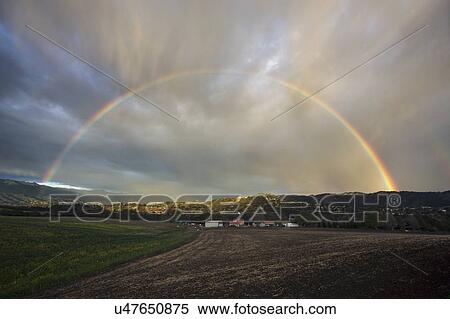 Oak View, California, USA, March 1, 2015, full rainbow over rain storm in Ojai Valley View Large Photo Image Stock Photography - Oak View, California, USA, March 1, 2015, full rainbow over rain storm in Ojai Valley. Fotosearch