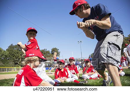 Oak View, California, USA, March 7, 2015, Ojai Valley Little League Field, youth Baseball, Spring, coach teaches Tee-Ball Division players View Large Photo Image Stock Image - Oak View, California, USA, March 7, 2015, Ojai Valley Little League Field, youth Baseball, Spring, coach teaches Tee-Ball Division players. Fotosearch