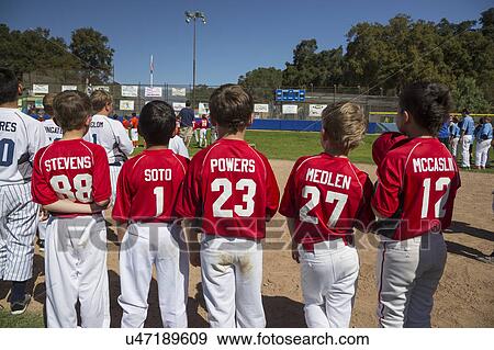 Oak View, California, USA, March 7, 2015, Ojai Valley Little League Field, youth Baseball, Spring, players uniforms show their names View Large Photo Image Stock Photo - Oak View, California, USA, March 7, 2015, Ojai Valley Little League Field, youth Baseball, Spring, players uniforms show their names. Fotosearch