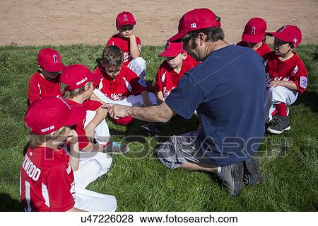 Oak View, California, USA, March 7, 2015, Ojai Valley Little League Field, youth Baseball, Spring, coach teaches Tee-Ball Division players View Large Photo Image Stock Photo - Oak View, California, USA, March 7, 2015, Ojai Valley Little League Field, youth Baseball, Spring, coach teaches Tee-Ball Division players. Fotosearch