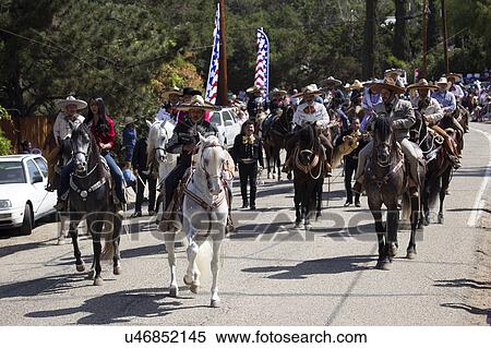 Stock Photography - Oak View, California, USA, May 24, 2015, Memorial Day Parade, hispanic horseback riders. Fotosearch