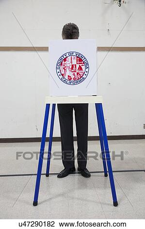 Oak View, California, USA, November 4, 2014, citizen votes in election booth polling station in gymnasium View Large Photo Image Stock Image - Oak View, California, USA, November 4, 2014, citizen votes in election booth polling station in gymnasium. Fotosearch