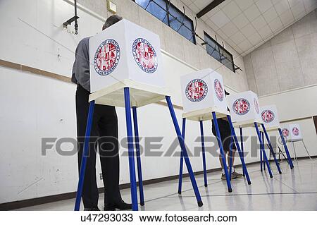 Oak View, California, USA, November 4, 2014, citizen votes in election booth polling station in gymnasium View Large Photo Image Stock Image - Oak View, California, USA, November 4, 2014, citizen votes in election booth polling station in gymnasium. Fotosearch