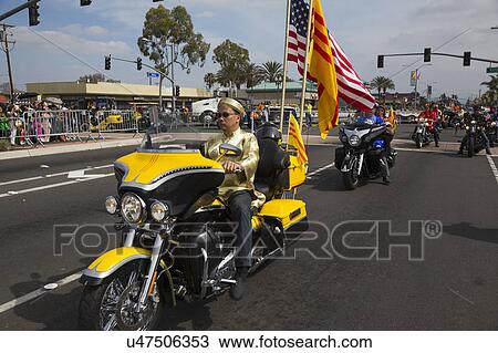 Stock Image - Orange County, City of Westminster, Southern California, USA, February 21, 2015, Little Saigon, Vietnamese-American Community, TET Parade celebrates Tet Lunar New Year, motorcycles in parade. Fotosearch